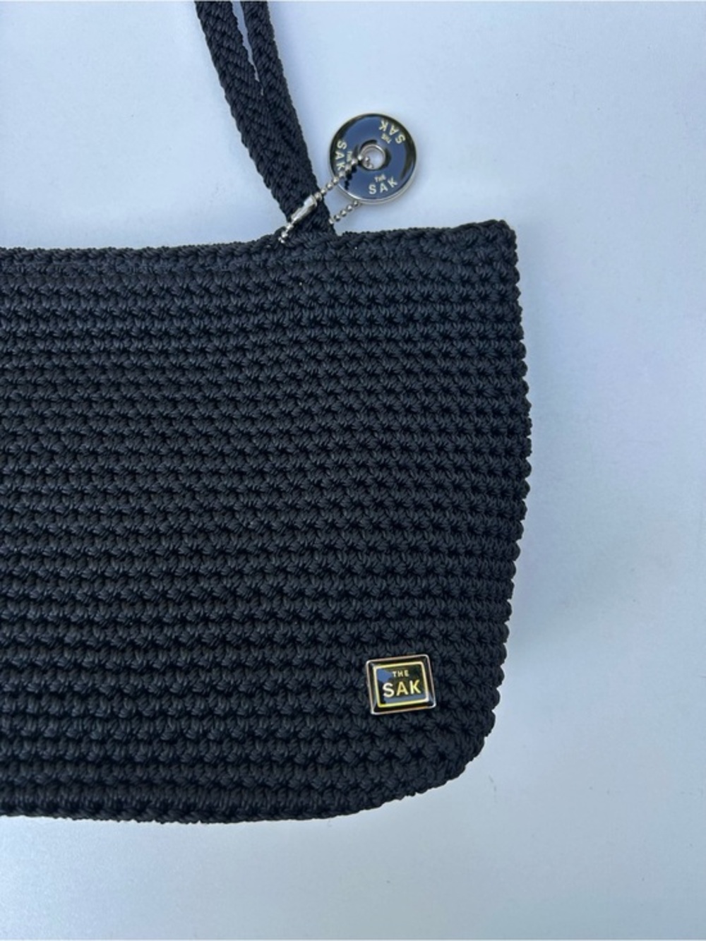THE SAK Small Black Crochet Handbag with Logo Plaque